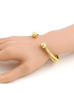 Sleek Gold Tone Bangle Bracelet with Mesh Inlay