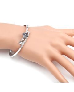 Trendsetting Silver Tone Hinged Bangle Bracelet with Clover Design and Sparkling Crystals